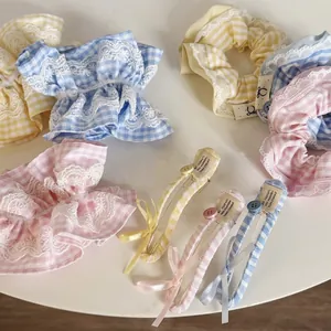 Pastel plaid scrunchies and bow hair clips with lace trim for girl ponytail styling