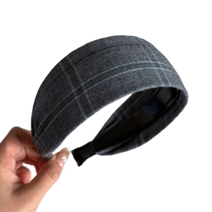 Elegant grey plaid wide headband with textured fabric for a classic British college style