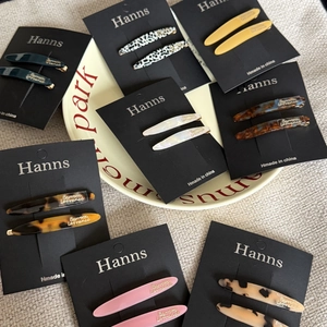 French acetate leaf hair clips set in various elegant marble and tortoiseshell patterns