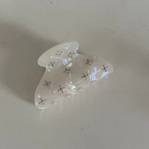 Elegant cream white shark hair claw clip with star shaped metal rhinestones