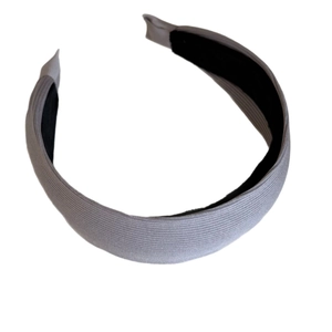 Serre-tête rembourré en tissu côtelé gris avec texture rayée et doublure antidérapante