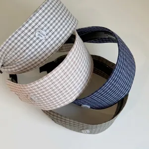 Set of four plaid wide headbands in grey, beige, navy and green with non-slip teeth