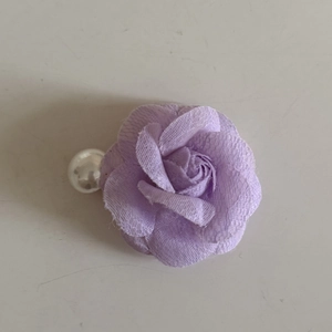 Elegant purple fabric camellia flower hair clip featuring a white pearl detail for women