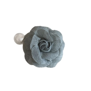 Elegant grey lace camellia flower hair clip with white pearl detail on white backdrop