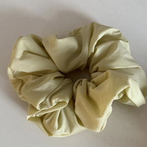 Fluffy yellow satin scrunchie for women, oversized hair tie with pleated fabric design