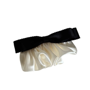 Elegant French vintage satin hair clip with black lace bow and creamy pleated ruffles