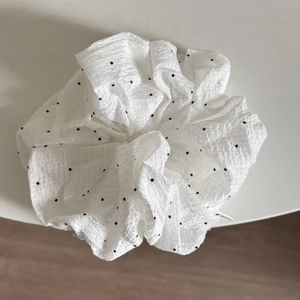 Polka dot oversized scrunchie in white crinkled fabric for elegant hair styling