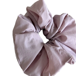 Fluffy pale pink-purple oversized scrunchie with pleated design for daily hair styling