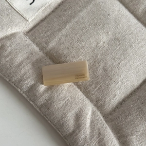 Macro shot of the mini baguette hair clip with France Handmade engraved texture