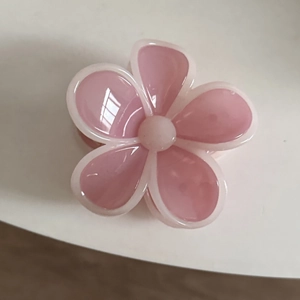 Pink jelly flower hair claw clip with five petals and glossy resin finish for women