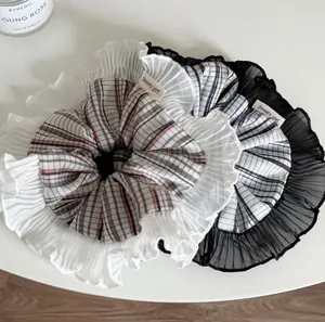 Plaid tulle scrunchie hair ties with ruffled edges and Sweety Girl woven label