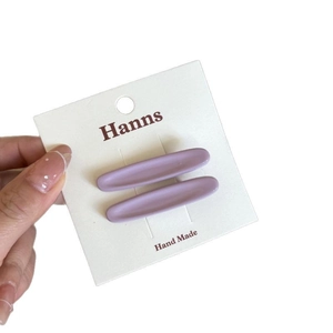Sweet matte lavender oval hair clip set for girls on a white handmade card display