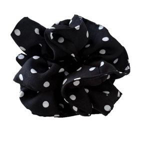 Elegant French style black scrunchie with white polka dots made of soft chiffon fabric