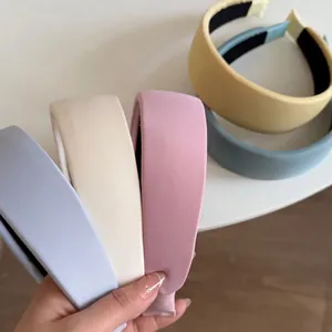 Padded satin headband set in macaron colors including pink and beige for women