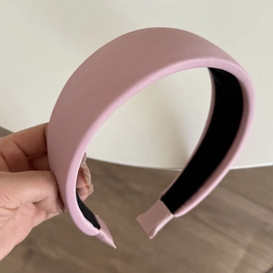 Pink satin padded headband featuring a high-top design and non-slip inner lining