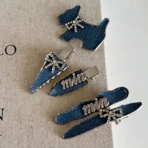 Lot de barrettes en denim bleu avec nœud en strass et motifs de chien sur tissu