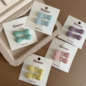 Cinq paires d'élégantes barrettes à cheveux à nœuds en résine aux tons pastel doux