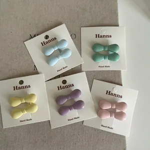 Barrettes à cheveux nœuds mats en couleurs pastel comme bleu, vert et rose lot de 2
