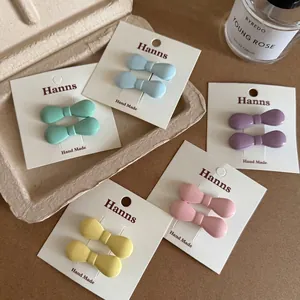 Élégantes Pinces à Cheveux en Métal avec Nœud Papillon pour Femmes Épingles à Cheveux avec Nœud en Résine Mate Style Coréen Minimaliste Pinces à Franges Latérales Accessoires de Coiffure