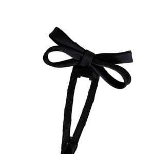 Classic black satin bow hair clip for women featuring a minimalist retro style design