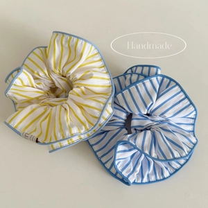 Set of two striped cotton scrunchies in yellow and blue with light blue piped edges