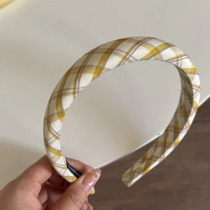 Handheld padded yellow plaid headband with high top sponge design for women