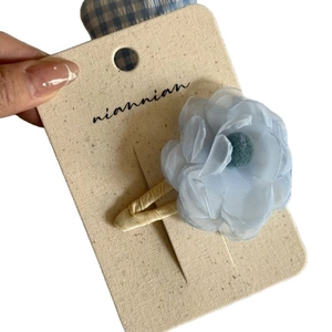 Handmade light blue fabric flower hair clips with cream base for women and girls