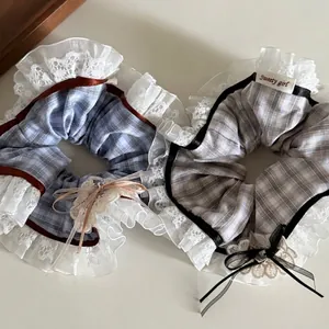 Floral plaid hair scrunchies with white lace edges and bow detail for sweet hairstyles