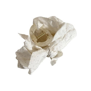 Elegant white scrunchie with black polka dots featuring a lace bow and pearl accent detail