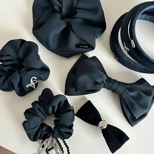 Elegant Prussian Blue hair accessory set featuring velvet bow clips and scrunchies