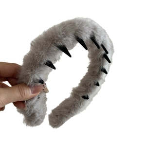 Grey faux fur leopard style headband with black plastic teeth for non-slip hair styling