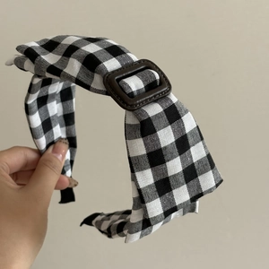 Vintage black and white gingham headband with a brown resin buckle for women