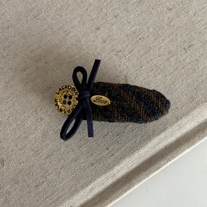 Vintage brown tweed bow hair clip with gold Christian Lacroix button and love charm