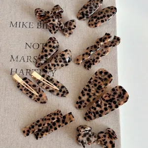 Set of stylish leopard print hair clips and acetate resin barrettes with gold metal