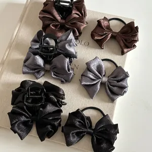 Elegant satin bow hair clip and scrunchie set in brown, gray, and black colors