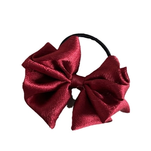 Elegant wine red satin bow hair tie with double-layered fabric and elastic band