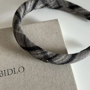 Elegant grey plaid padded headband with vintage silver metallic accent for women