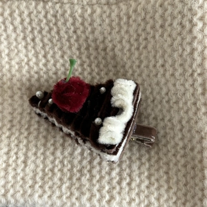 Cute chocolate cake hair clip with plush cream layer and cherry detail for girls