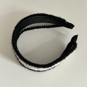 Elegant black and white woven textured headband with plush fabric for women