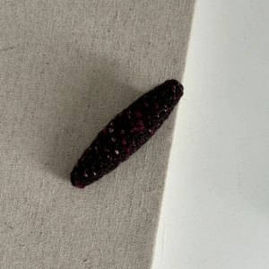 Elegant plum tweed hair clip with woven texture for women styling and side bangs
