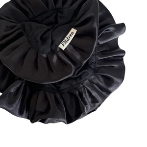 French style double-layered satin black scrunchie with ruffled edges and logo label