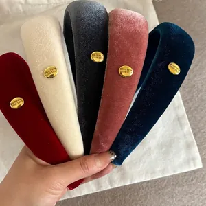 Velvet padded headband set with golden metal buckle and retro high top design for women
