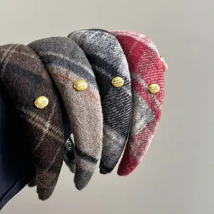 Set of four wide plaid tweed headbands with golden metal buckle and premium texture