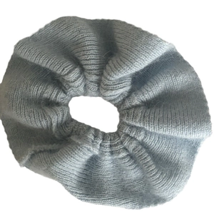 Knitted light blue mohair hair scrunchie with soft fuzzy texture for women