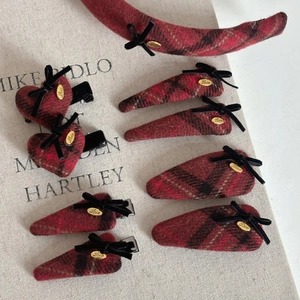 Red plaid hair accessories set with black velvet bows and golden Love charms