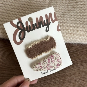 Pink and brown bow flower hair clip set for girls on a white handmade display card