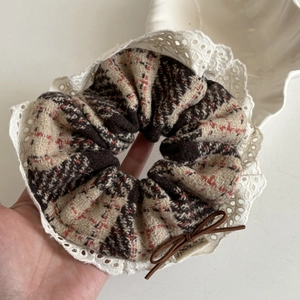Brown plaid scrunchie with lace trim and sweet bow for women's hair styling