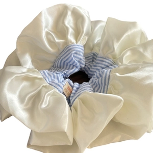Blue striped satin scrunchie with cream lace and handmade tag in a fresh aesthetic style