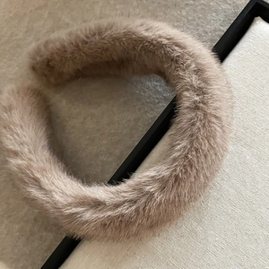 Thick plush headband in khaki faux fur with soft texture for winter hairstyle accessory