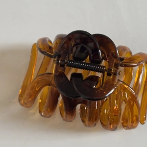 Large tortoiseshell resin hair claw clip with cutout design for thick hair